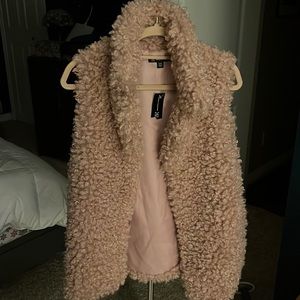 blush faux fur vest with pockets